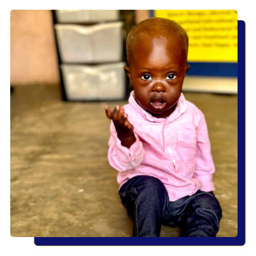Murungi-Michael-going-treatment-Rowans-down-syndrome-awareness-centre-hoima-uganda-east-africa